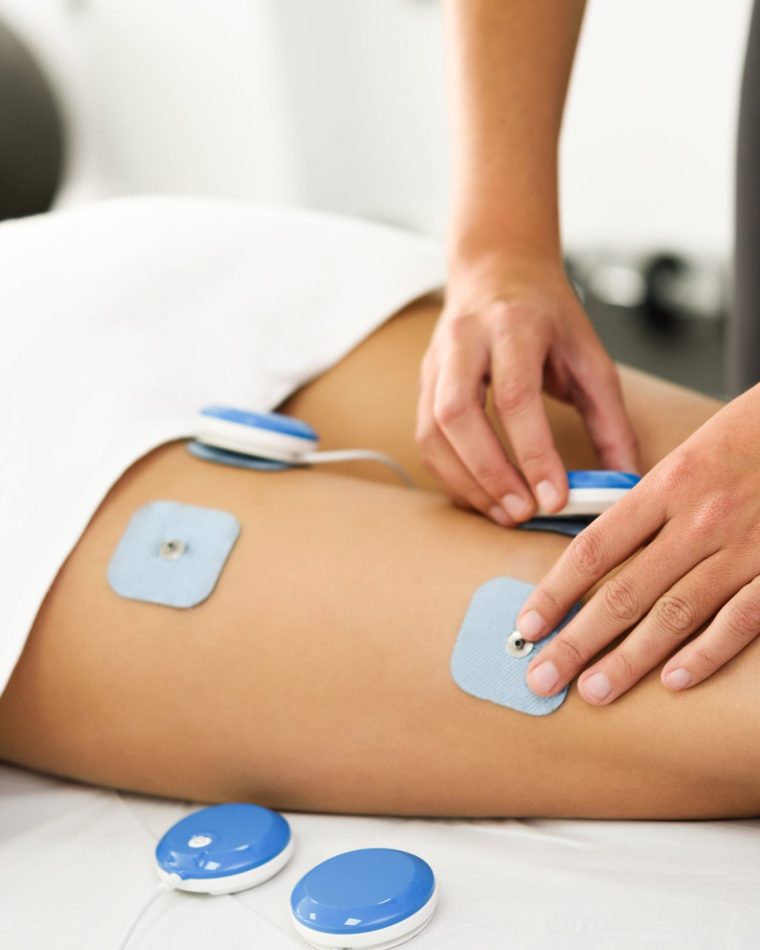 physiotherapist-applying-electro-stimulation-in-ph-2021-08-26-20-00-09-utc-min